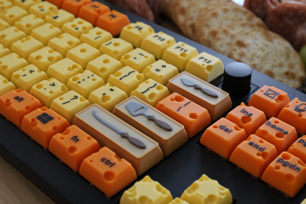 teclado de queijo suíço